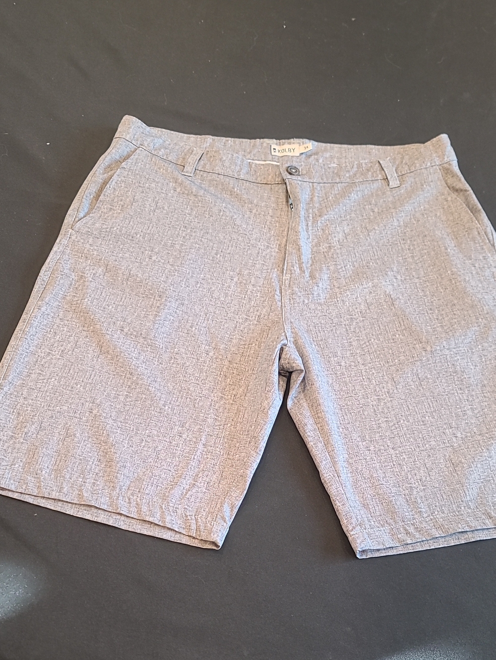 grey, textured Kolby shorts feature a flat front design Lightweight. Sz 34
